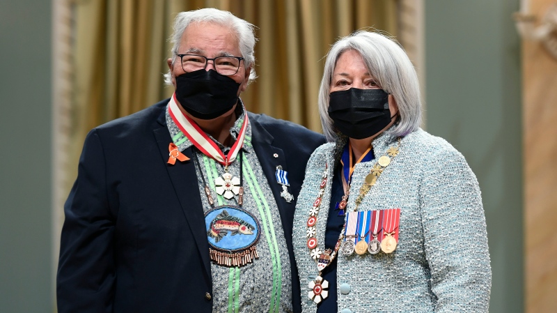 Justice Murray Sinclair stands with Gov. Gen. Mary Simon after being invested as a companion of the Order of Canada and receiving a Meritorious Service Decoration (Civil Division), at a Canadian Honours ceremony at Rideau Hall in Ottawa, on Thursday, May 26, 2022. THE CANADIAN PRESS/Justin Tang