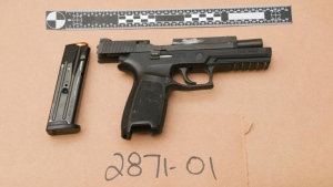 A 25-year-old Calgary man has been charged after a loaded handgun and quantities of drugs were found inside a southwest home. (Supplied)