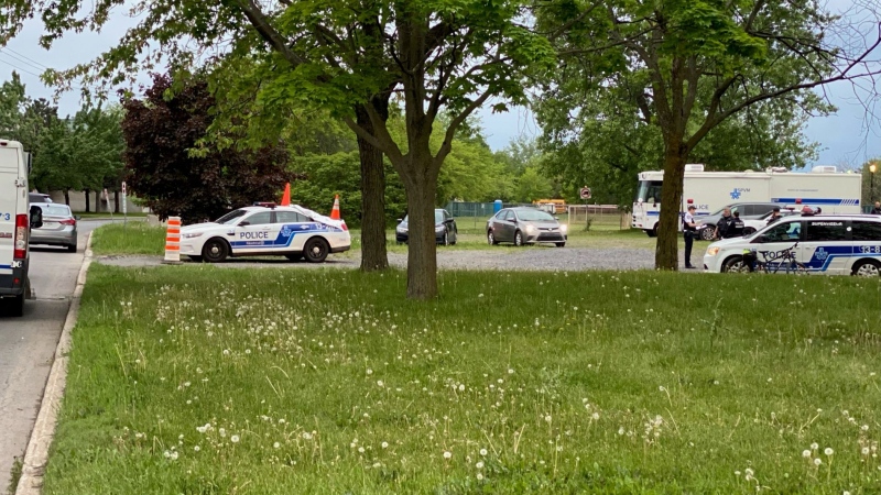 Montreal police respond to a shooting incident on a fellow officer who was conducting a speed enforcement operation in Montreal's LaSalle borough on Thursday, May 26, 2022. (Cosmo Santamaria/CTV News)