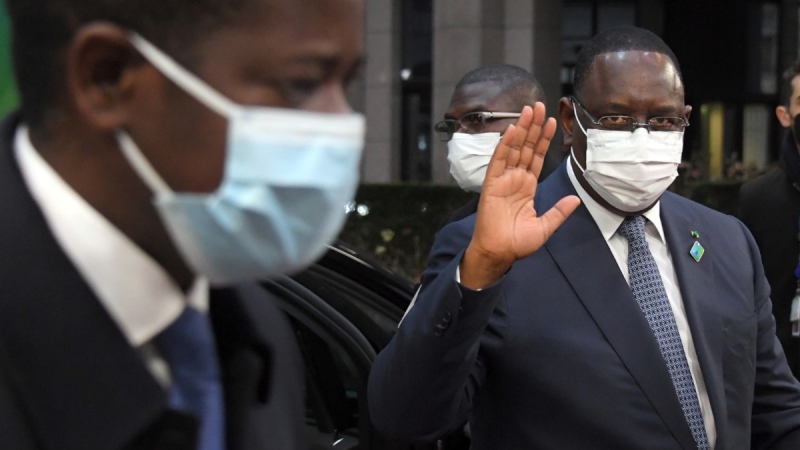 File photo of Senegal's President Macky Sall, right, arriving for an EU Africa summit in Brussels, on Feb. 18, 2022. (John Thys, Pool Photo via AP) 