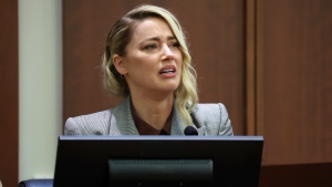 Amber Heard testifies in the courtroom in the Fairfax County Circuit Courthouse in Fairfax, Va., Thursday, May 26, 2022. (Michael Reynolds/Pool Photo via AP)