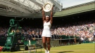 FILE - Serena Williams of the United States holds up the trophy after winning the women's singles final against Garbine Muguruza of Spain at the All England Lawn Tennis Championships in Wimbledon, London, Saturday, July 11, 2015. (Sean Dempsey/Pool via AP, File)