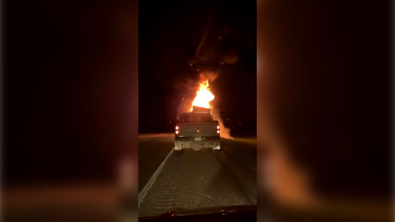 A video screenshot shows a semi-trailer carrying cheese on fire in the RM of North Norfolk on May 26, 2022 (Supplied photo: Michelle Coupland)