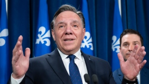 Quebec Premier Francois Legault responds to reporters' questions after Bill 96, a legislation modifying Quebec's language law, was voted, Tuesday, May 24, 2022 at the legislature in Quebec City. THE CANADIAN PRESS/Jacques Boissinot