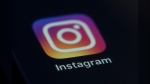 This photo shows the Instagram app icon on the screen of a mobile device on Aug. 23, 2019. (AP Photo/Jenny Kane, File)