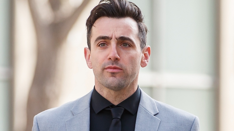 Canadian musician Jacob Hoggard arrives for his sex assault trial at the Toronto courthouse on Tuesday, May 10, 2022 in Toronto. THE CANADIAN PRESS/Cole Burston 