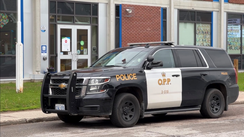 An OPP SUV outside Renfrew Collegiate Institute on Tuesday, June 7, 2022. Police are at the school in response to a 'potential safety concern,' the school board says. (Tyler Fleming/CTV News Ottawa)