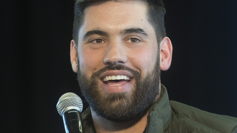 NFL player Laurent Duvernay-Tardif speaks during a news conference before an event to celebrate his Super Bowl win in Montreal, Sunday, February 9, 2020. THE CANADIAN PRESS/Graham Hughes