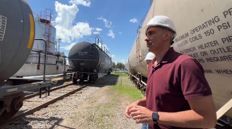 Nylene managing director, Ralph Anzarouth, observes the company’s latest cargo-train shipment of material required to manufacture nylon. Arnprior Ont. June 8, 2022. (Tyler Fleming/CTV News Ottawa)