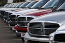 In this photo made Sept. 13, 2009, unsold 2009 Ram pickup trucks sit at a Dodge dealership in Littleton, Colo. (AP Photo/David Zalubowski)