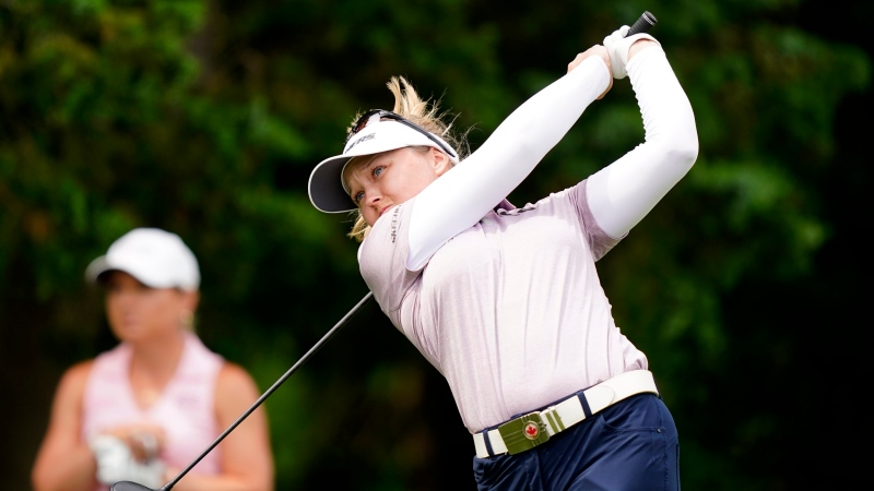 Brooke M. Henderson, of Canada, hits off the 18th tee during a playoff in the ShopRite LPGA Classic golf tournament, Sunday, June 12, 2022, in Galloway, N.J. (AP Photo/Matt Rourke)