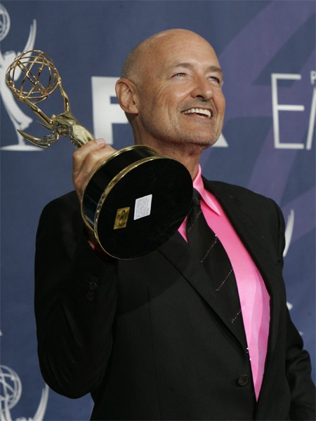 Terry O'Quinn holds up his Emmy backstage for outstanding supporting actor in a drama series for "Lost" at the 59th Primetime Emmy Awards at the Shrine Auditorium in Los Angeles, Sunday, Sept. 16, 2007. (AP / Reed Saxon) 