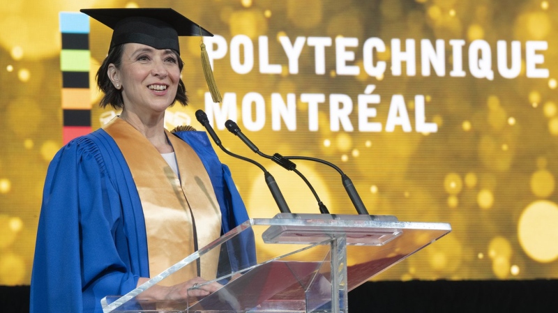 Polytechnique survivor Nathalie Provost addresses the audience after receiving an honorary doctorate during a graduation ceremony in Montreal on Thursday, June 16, 2022. The doctorate is awarded to Provost more than 32 years after a gunman motivated by a hatred of feminists opened fire at Ecole Polytechnique, killing 14 women and injuring others. THE CANADIAN PRESS/Paul Chiasson