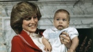 Prince William, the 6-month old son of Prince Charles and Princess Diana, with his mother during a photo call at Kensington Palace in London, England, Dec. 22, 1982. (AP Photo/David Caulkin)
