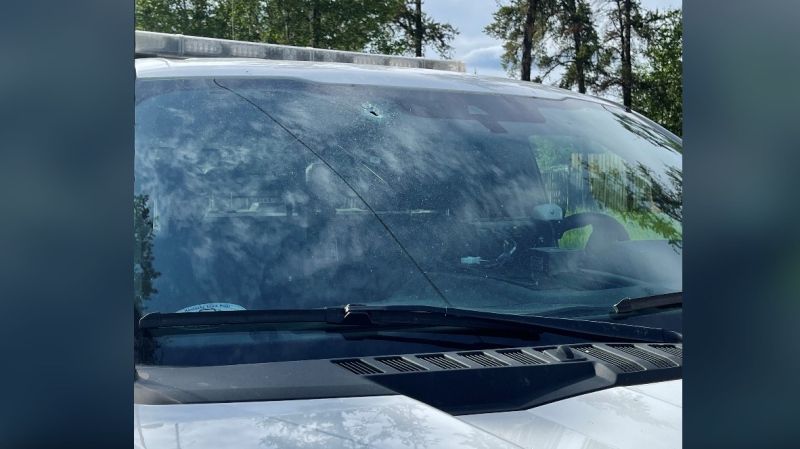 A Saskatchewan RCMP vehicle was shot in the windshield and radiator in La Ronge on June 19, 2022, RCMP say. (Courtesy RCMP)