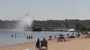 People seek relief from the hot and humid weather at the Barrie waterfront. (CTV NEWS/Catalina Gillies)