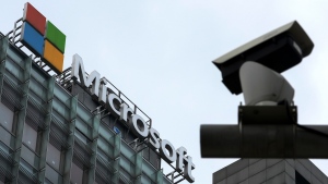 A security surveillance camera is seen near the Microsoft office building in Beijing, July 20, 2021. (AP Photo/Andy Wong, File)
