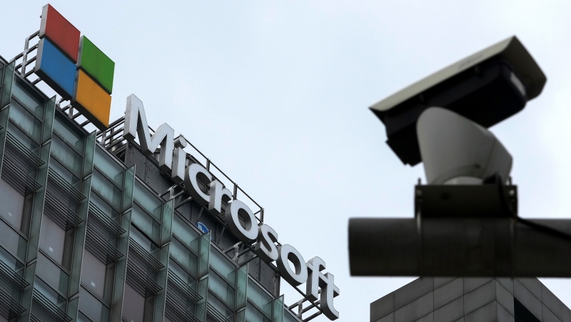 A security surveillance camera is seen near the Microsoft office building in Beijing, July 20, 2021. (AP Photo/Andy Wong, File)