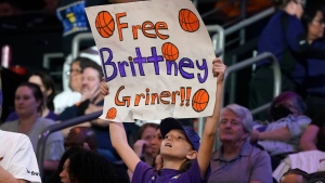 Phoenix Mercury fan holds a sign 'Free Brittney Griner' during a WNBA basketball game, on May 6, 2022. (Darryl Webb / AP) 