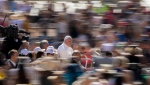 Pope Francis arrives to his weekly general audience in St. Peter's Square at The Vatican Wednesday, June 15, 2022. (AP Photo/Andrew Medichini)