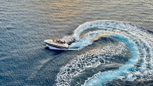 A stock photograph shows a boat travelling on water. (Pexels/iSAW COMPANY)