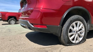 Slashed tires at the Waterloo Nissan dealership in Waterloo on June 24, 2022. (Dan Lauckner/CTV Kitchener)