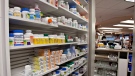 Shelves of medication are seen at a pharmacy. (THE CANADIAN PRESS/Jacques Boissinot)