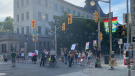 People protest outside the U.S. Embassy in Ottawa after the U.S. Supreme Court overturned the Roe v. Wade ruling. (Brenda Woods/CTV News Ottawa)