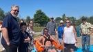 Members of Innisfil council join a user of the town's new beach wheelchair on Sat. June 25, 2022 (Courtesy: Town of Innisfil)
