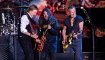 Paul McCartney, from left, Dave Grohl and Bruce Springsteen perform at Glastonbury Festival in Worthy Farm, Somerset, England, Saturday, June 25, 2022. (Photo by Joel C Ryan/Invision/AP)