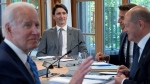 Prime Minister Justin Trudeau joins US President Joe Biden, French President Emanuel Macron, and German Chancellor Olaf Scholz around the table for the first plenary session at the G7 Summit in Schloss Elmau on Sunday, June 26, 2022. THE CANADIAN PRESS/Paul Chiasson