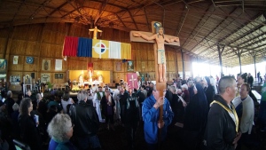 A procession makes its way out at the end of a mass at the Lac Ste. Anne Pilgrimage in this undated handout image provided on June 17, 2022, by the Catholic Diocese of Archdiocese of Edmonton. (THE CANADIAN PRESS/Lincoln Ho)