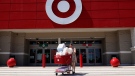 A customer exits from a Target store on May 18, 2022 in Miami, Florida. (Joe Raedle/Getty Images via CNN)