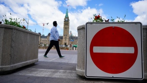 Signs are pictured on Parliament Hill prior to Canada Day, in Ottawa on Monday, June 27, 2022. (Sean Kilpatrick/THE CANADIAN PRESS)