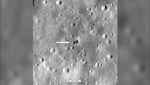 A rocket body hit the moon on March 4, creating a double crater, as indicated by the white arrow. (NASA/Goddard/Arizona State University/CNN)

