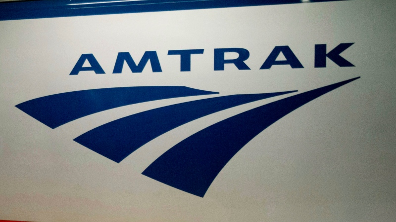 In this Feb. 6, 2014 file photo, an Amtrak logo is seen on a train at 30th Street Station in Philadelphia. (AP Photo/Matt Rourke, File)