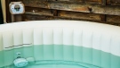 An inflatable hot tub is seen in a Shutterstock image.
