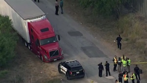 Dozens of people found dead in a truck