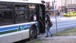 A passenger boards a London Transit bus on June 27, 2022. (Daryl Newcombe/CTV News London)