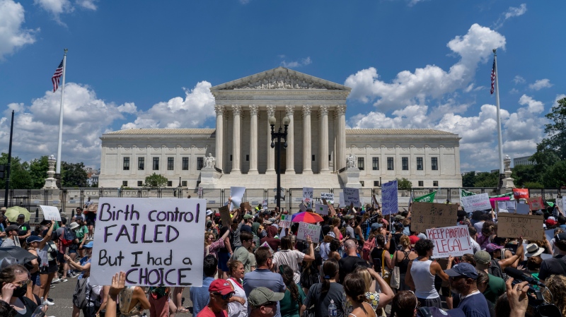 Abortion-rights protesters demonstrate outside the Supreme Court in Washington on June 25, 2022. The Supreme Court has ended constitutional protections for abortion that had been in place nearly 50 years, a decision by its conservative majority to overturn the court's landmark abortion cases. (AP Photo/Gemunu Amarasinghe)