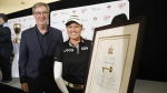 Canadian golfer Brooke Henderson receives the key to the city of Ottawa from Ottawa mayor Jim Watson at a press conference for the 2022 CP Women's Open golf tournament at the Ottawa Hunt Golf and Country Club on Tuesday, June 28, 2022. (Patrick Doyle/THE CANADIAN PRESS)