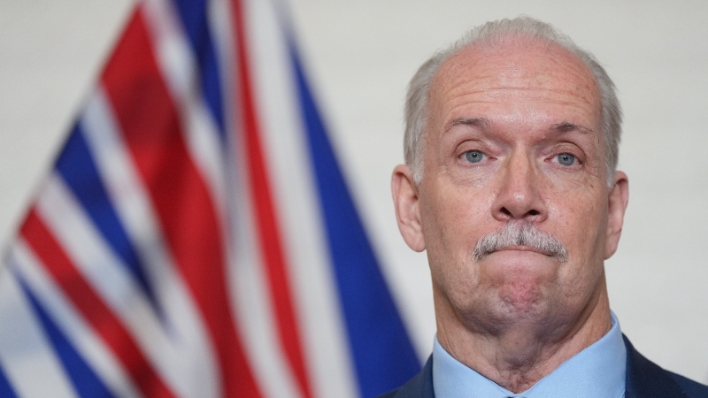 B.C. Premier John Horgan pauses while announcing he will not run in the next provincial election during a news conference in Vancouver, on Tuesday, June 28, 2022. THE CANADIAN PRESS/Darryl Dyck 