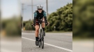 Bianca Hayes, who attempted to set a Guinness World Record biking across Canada, is seen cycling in an undated image.