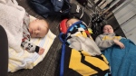 Jennifer Macdougall's family sleeps on the floor of Toronto Pearson Airport (Handout from Macdougall)
