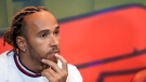 Mercedes driver Lewis Hamilton of Britain attends a news conference at the Baku circuit, in Baku, Azerbaijan, Friday, June 10, 2022. The Formula One Grand Prix will be held on Sunday. (AP Photo/Sergei Grits)