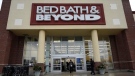 Shoppers enter and exit a Bed Bath & Beyond in Schaumburg, Ill., Thursday, Jan. 14, 2021. (AP Photo/Nam Y. Huh)