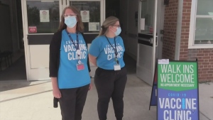 Health-care workers outside a COVID-19 vaccination clinic in Barrie, Ont. (CTV News/Ian Duffy)
