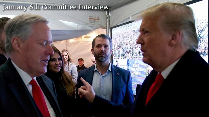 This exhibit from video released by the House Select Committee, shows a photo of former U.S. President Donald Trump talking to his chief of staff Mark Meadows before Trump spoke at the rally on the Ellipse on Jan 6, displayed at a hearing by the House select committee investigating the Jan. 6 attack on the U.S. Capitol, Tuesday, June 28, 2022, on Capitol Hill in Washington. (House Select Committee via AP)