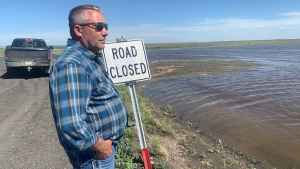RM of LAJORD Reeve Armond Gervais checks out flooded fields in his area. An estimated 10,000 acres of crop was destroyed when Wascana Creek overflowed. (Wayne Mantyka / CTV News)