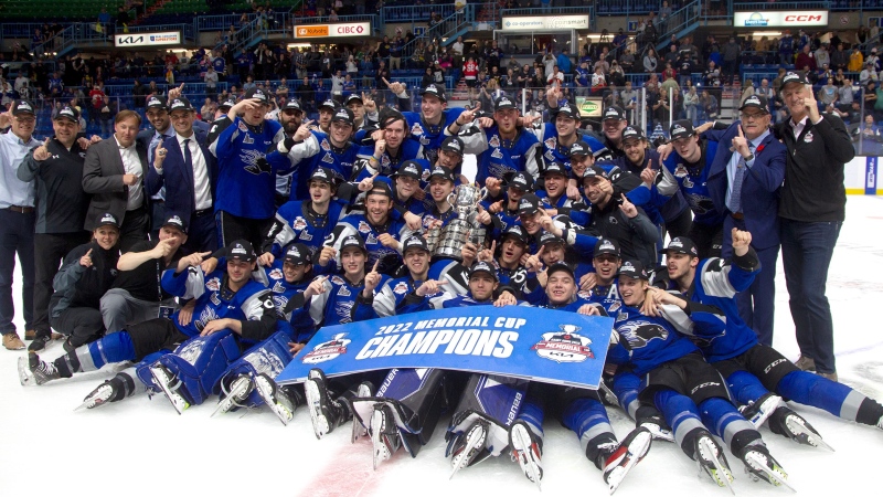 The Saint John Sea Dogs, the 2022 Memorial Cup Champions, pose for a team photo after defeating the Hamilton Bulldogs in Saint John, N.B., Wednesday, June 29, 2022. (THE CANADIAN PRESS/Ron Ward)